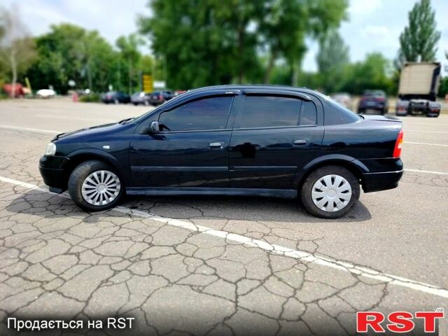 Черный Опель Астра, объемом двигателя 1.4 л и пробегом 320 тыс. км за 3300 $, фото 3 на Automoto.ua