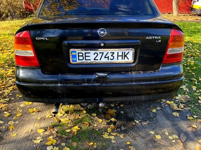 Черный Опель Астра, объемом двигателя 1.4 л и пробегом 168 тыс. км за 2450 $, фото 5 на Automoto.ua