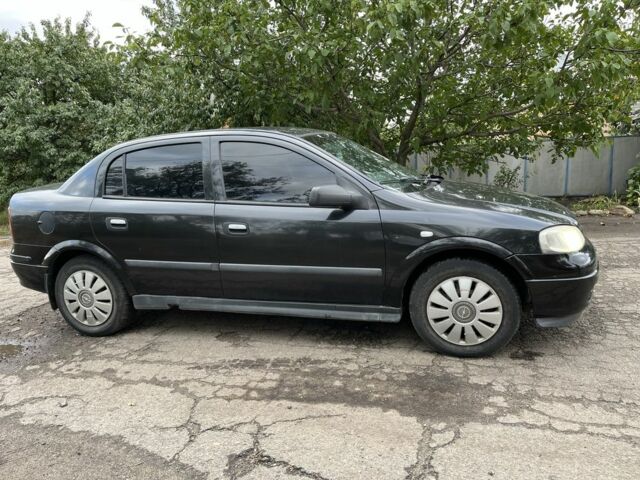 Черный Опель Астра, объемом двигателя 1.4 л и пробегом 1000 тыс. км за 2500 $, фото 3 на Automoto.ua