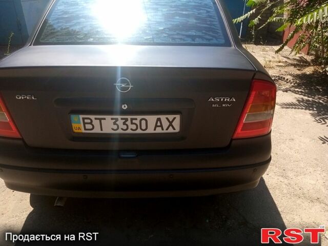 Черный Опель Астра, объемом двигателя 1.4 л и пробегом 100 тыс. км за 3300 $, фото 4 на Automoto.ua
