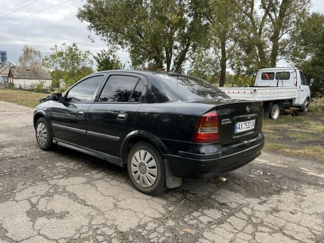 Черный Опель Астра, объемом двигателя 1.4 л и пробегом 1000 тыс. км за 2500 $, фото 4 на Automoto.ua