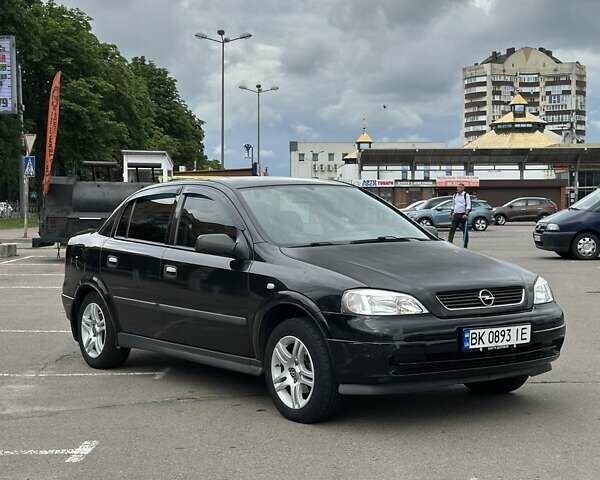 Черный Опель Астра, объемом двигателя 1.4 л и пробегом 277 тыс. км за 3300 $, фото 8 на Automoto.ua
