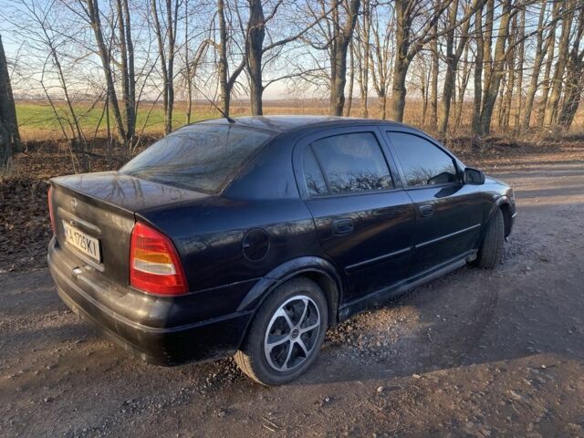 Черный Опель Астра, объемом двигателя 1.4 л и пробегом 219 тыс. км за 3400 $, фото 13 на Automoto.ua