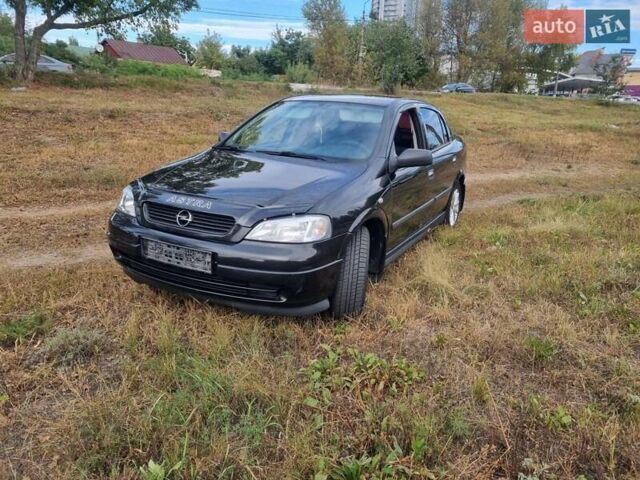 Черный Опель Астра, объемом двигателя 1.6 л и пробегом 171 тыс. км за 4250 $, фото 2 на Automoto.ua