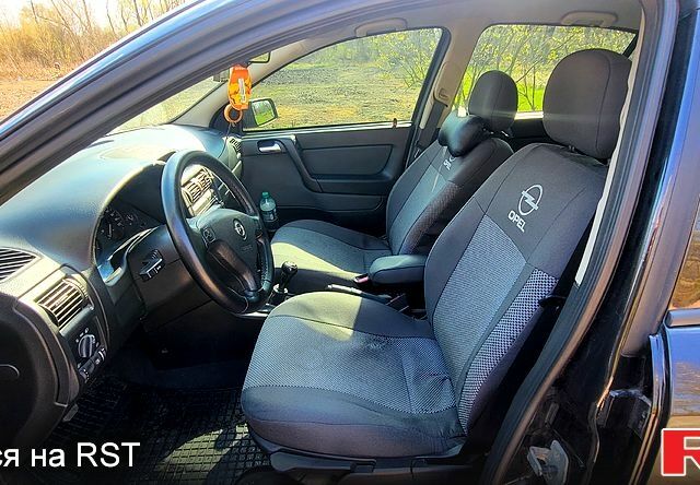 Чорний Опель Астра, об'ємом двигуна 1.6 л та пробігом 260 тис. км за 4150 $, фото 8 на Automoto.ua