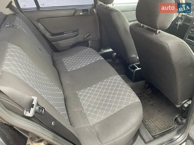 Чорний Опель Астра, об'ємом двигуна 1.36 л та пробігом 198 тис. км за 3950 $, фото 13 на Automoto.ua