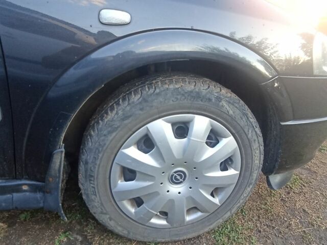 Черный Опель Астра, объемом двигателя 1.4 л и пробегом 129 тыс. км за 3700 $, фото 11 на Automoto.ua