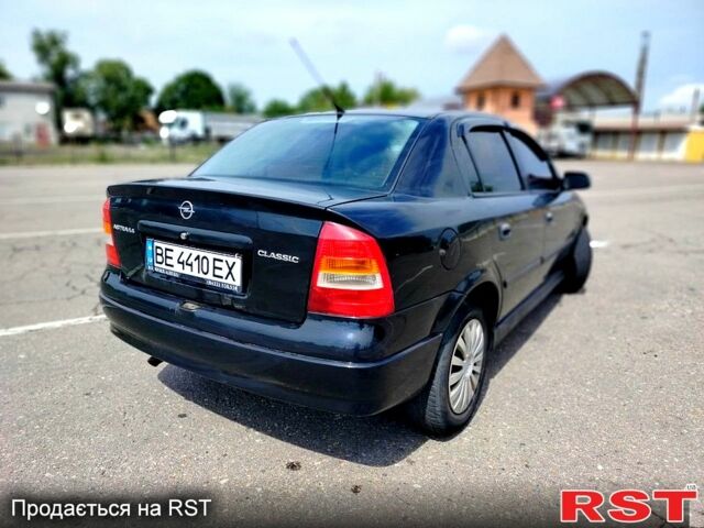 Черный Опель Астра, объемом двигателя 1.4 л и пробегом 320 тыс. км за 3300 $, фото 1 на Automoto.ua