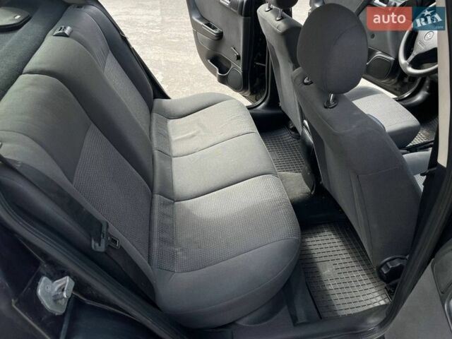 Черный Опель Астра, объемом двигателя 1.4 л и пробегом 270 тыс. км за 3000 $, фото 14 на Automoto.ua