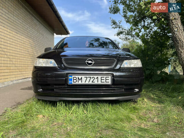 Чорний Опель Астра, об'ємом двигуна 1.4 л та пробігом 209 тис. км за 5000 $, фото 2 на Automoto.ua