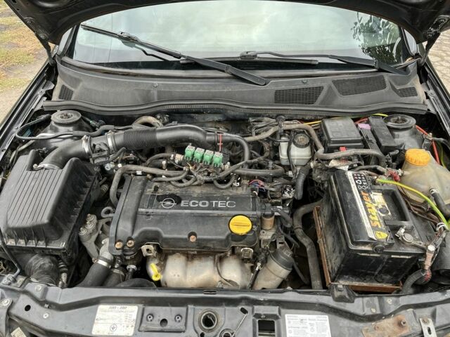 Черный Опель Астра, объемом двигателя 1.4 л и пробегом 1000 тыс. км за 2500 $, фото 6 на Automoto.ua