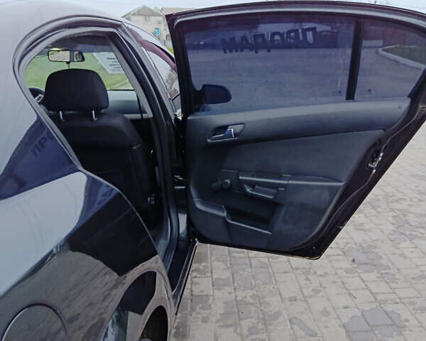 Черный Опель Астра, объемом двигателя 1.8 л и пробегом 212 тыс. км за 4999 $, фото 14 на Automoto.ua