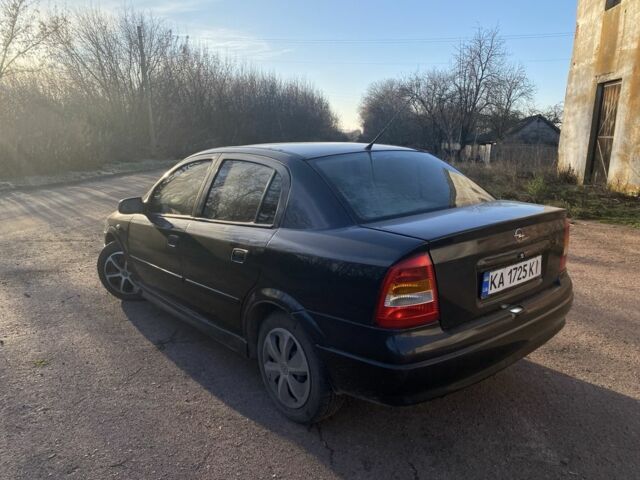 Черный Опель Астра, объемом двигателя 1.4 л и пробегом 219 тыс. км за 3400 $, фото 5 на Automoto.ua