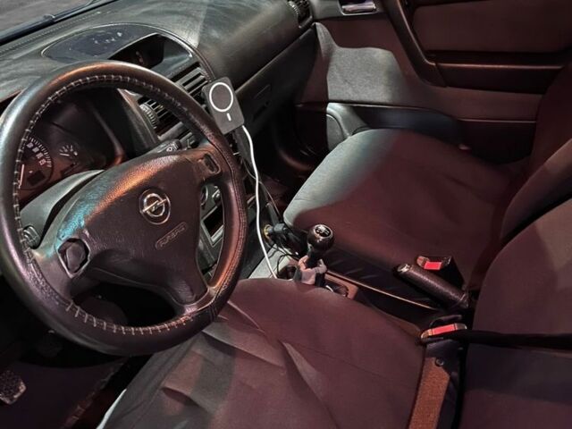 Черный Опель Астра, объемом двигателя 1.4 л и пробегом 338 тыс. км за 2300 $, фото 5 на Automoto.ua