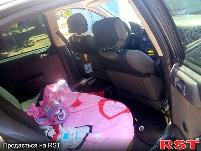 Черный Опель Астра, объемом двигателя 1.4 л и пробегом 100 тыс. км за 3300 $, фото 5 на Automoto.ua