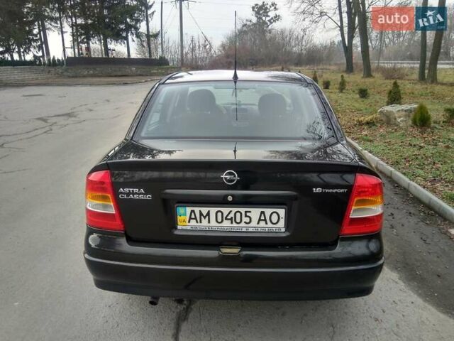 Черный Опель Астра, объемом двигателя 1.6 л и пробегом 198 тыс. км за 4100 $, фото 4 на Automoto.ua