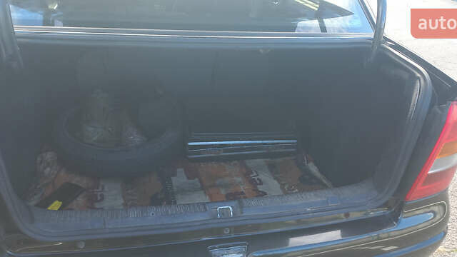 Чорний Опель Астра, об'ємом двигуна 1.36 л та пробігом 290 тис. км за 3900 $, фото 3 на Automoto.ua