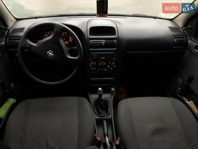 Черный Опель Астра, объемом двигателя 1.36 л и пробегом 292 тыс. км за 2700 $, фото 10 на Automoto.ua
