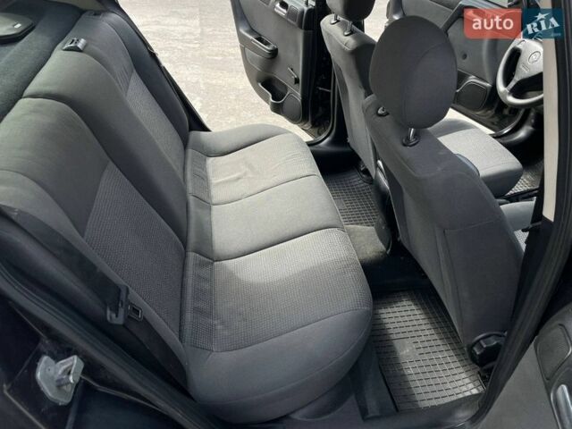 Черный Опель Астра, объемом двигателя 1.4 л и пробегом 270 тыс. км за 3000 $, фото 15 на Automoto.ua