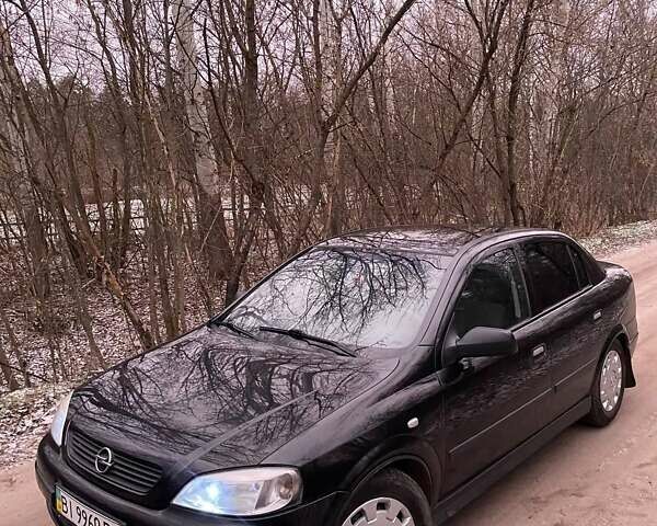 Черный Опель Астра, объемом двигателя 1.4 л и пробегом 160 тыс. км за 3500 $, фото 1 на Automoto.ua