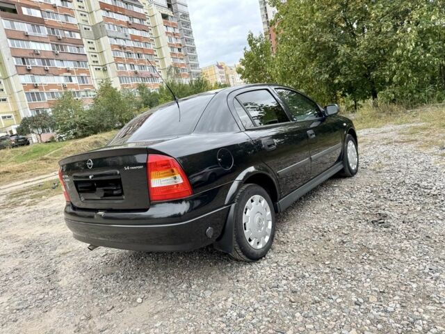 Черный Опель Астра, объемом двигателя 1.4 л и пробегом 176 тыс. км за 4390 $, фото 6 на Automoto.ua