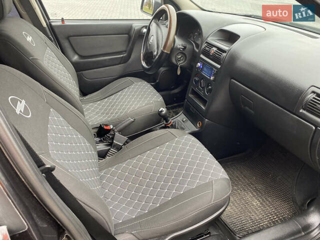 Чорний Опель Астра, об'ємом двигуна 1.36 л та пробігом 198 тис. км за 3950 $, фото 12 на Automoto.ua