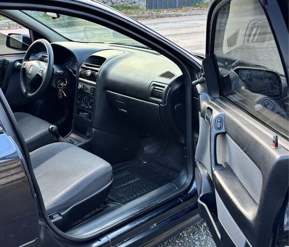 Чорний Опель Астра, об'ємом двигуна 1.4 л та пробігом 250 тис. км за 2500 $, фото 5 на Automoto.ua