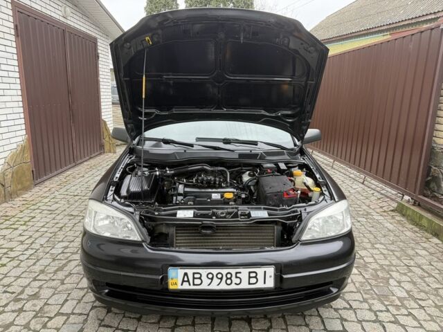 Черный Опель Астра, объемом двигателя 1.4 л и пробегом 160 тыс. км за 4000 $, фото 16 на Automoto.ua