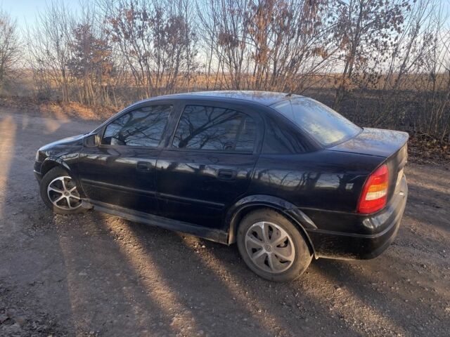 Черный Опель Астра, объемом двигателя 1.4 л и пробегом 219 тыс. км за 3400 $, фото 12 на Automoto.ua