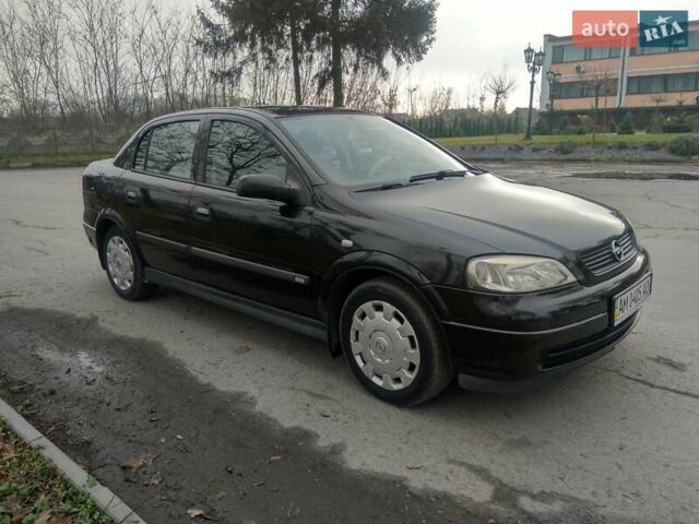 Черный Опель Астра, объемом двигателя 1.6 л и пробегом 198 тыс. км за 4100 $, фото 1 на Automoto.ua