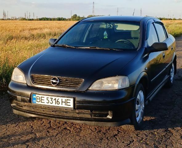 Черный Опель Астра, объемом двигателя 1.4 л и пробегом 268 тыс. км за 3400 $, фото 6 на Automoto.ua