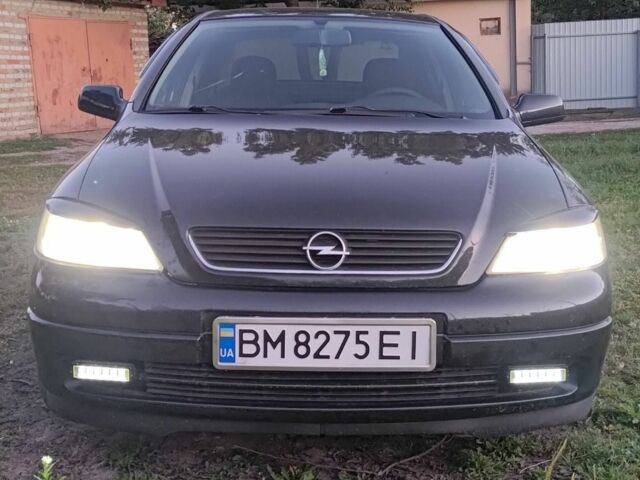 Черный Опель Астра, объемом двигателя 1.4 л и пробегом 100 тыс. км за 3900 $, фото 6 на Automoto.ua