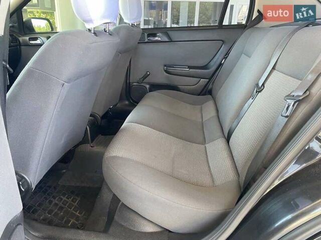 Черный Опель Астра, объемом двигателя 1.4 л и пробегом 107 тыс. км за 4800 $, фото 13 на Automoto.ua