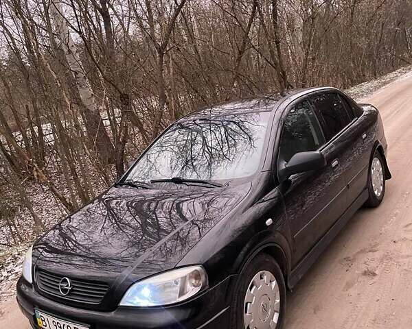 Черный Опель Астра, объемом двигателя 1.4 л и пробегом 160 тыс. км за 3500 $, фото 7 на Automoto.ua