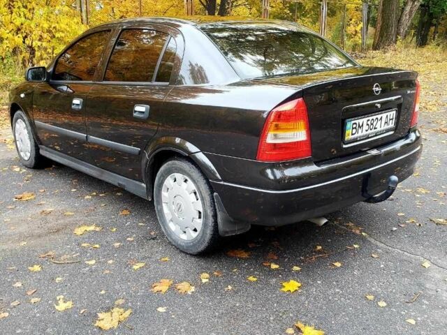 Черный Опель Астра, объемом двигателя 1.4 л и пробегом 265 тыс. км за 3150 $, фото 2 на Automoto.ua