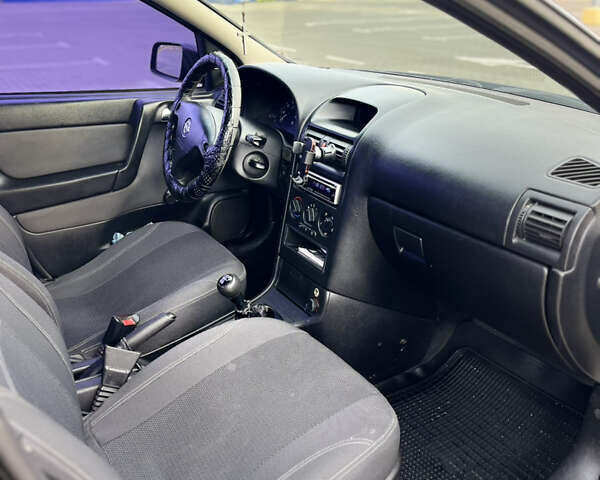 Опель Астра 2007 в Львове на Automoto.ua Черный Опель Астра, объемом двигателя 1.4 л и пробегом 210 тыс. км за 3800 $, фото 13 на Automoto.ua