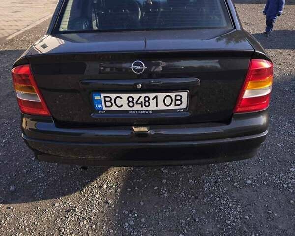 Черный Опель Астра, объемом двигателя 1.6 л и пробегом 217 тыс. км за 3800 $, фото 29 на Automoto.ua