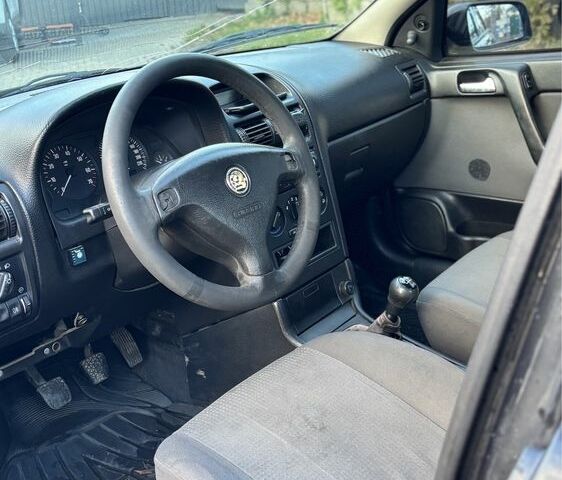 Чорний Опель Астра, об'ємом двигуна 1.4 л та пробігом 250 тис. км за 2500 $, фото 6 на Automoto.ua