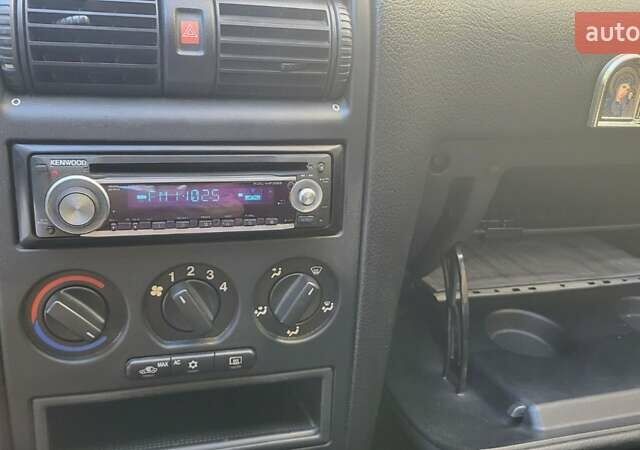 Черный Опель Астра, объемом двигателя 1.6 л и пробегом 122 тыс. км за 5700 $, фото 4 на Automoto.ua