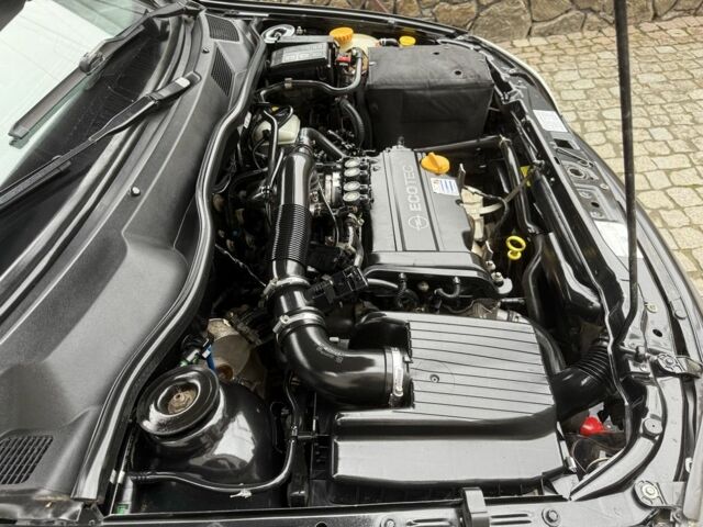 Черный Опель Астра, объемом двигателя 1.4 л и пробегом 160 тыс. км за 4000 $, фото 20 на Automoto.ua