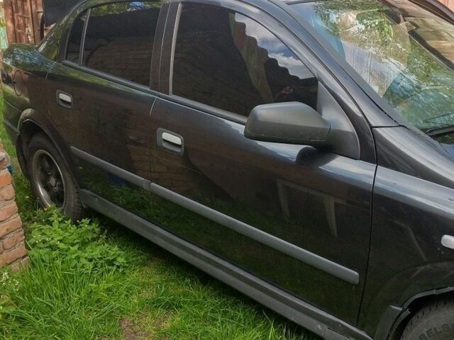 Черный Опель Астра, объемом двигателя 1.6 л и пробегом 2 тыс. км за 2000 $, фото 4 на Automoto.ua