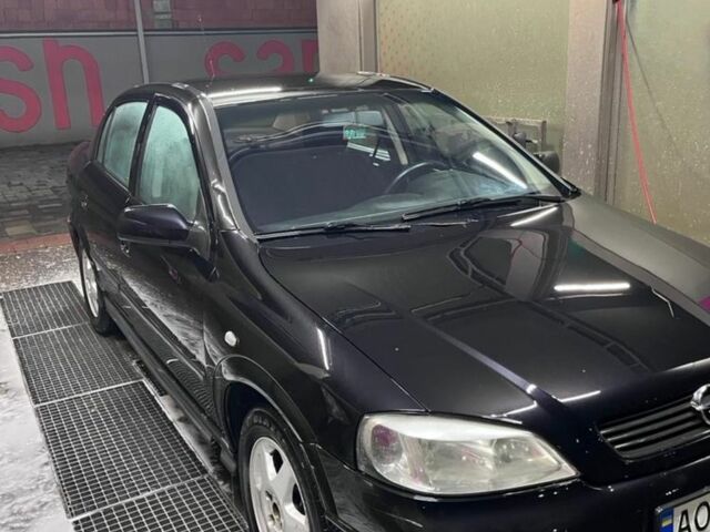 Черный Опель Астра, объемом двигателя 1.4 л и пробегом 338 тыс. км за 2300 $, фото 12 на Automoto.ua