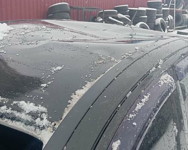 Черный Опель Астра, объемом двигателя 1.4 л и пробегом 150 тыс. км за 2300 $, фото 1 на Automoto.ua