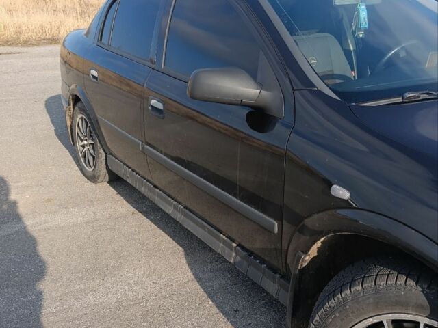 Черный Опель Астра, объемом двигателя 0 л и пробегом 290 тыс. км за 4000 $, фото 7 на Automoto.ua