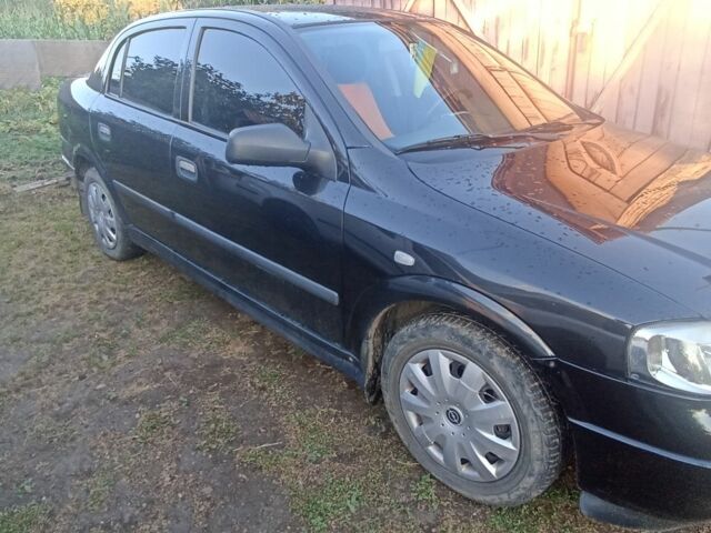 Черный Опель Астра, объемом двигателя 1.4 л и пробегом 129 тыс. км за 3700 $, фото 16 на Automoto.ua