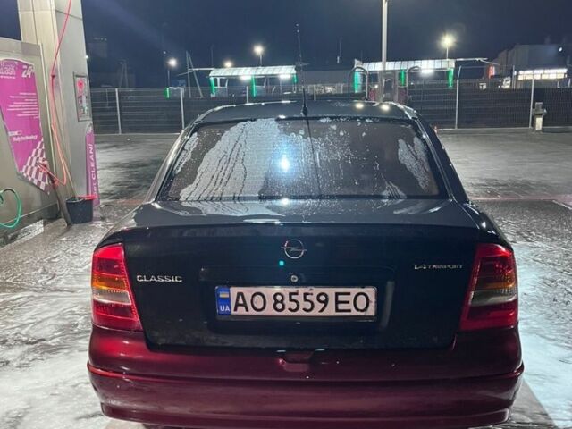 Черный Опель Астра, объемом двигателя 1.4 л и пробегом 338 тыс. км за 2300 $, фото 8 на Automoto.ua