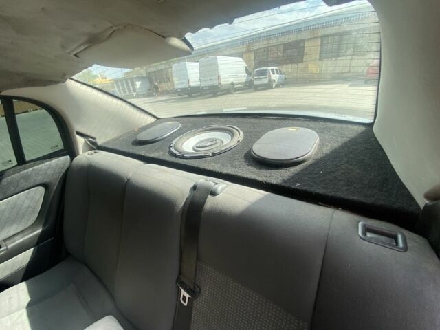 Черный Опель Астра, объемом двигателя 1.4 л и пробегом 400 тыс. км за 2650 $, фото 7 на Automoto.ua