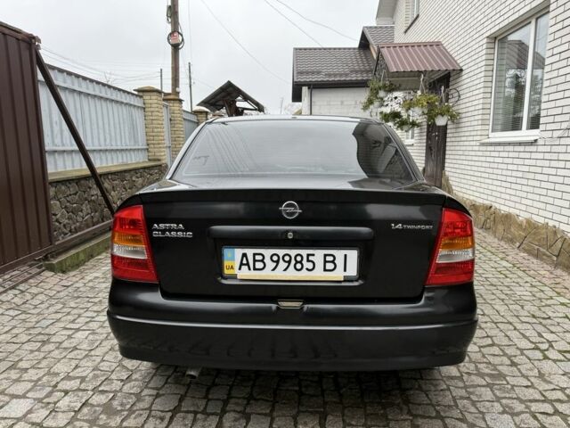 Черный Опель Астра, объемом двигателя 1.4 л и пробегом 160 тыс. км за 4000 $, фото 4 на Automoto.ua
