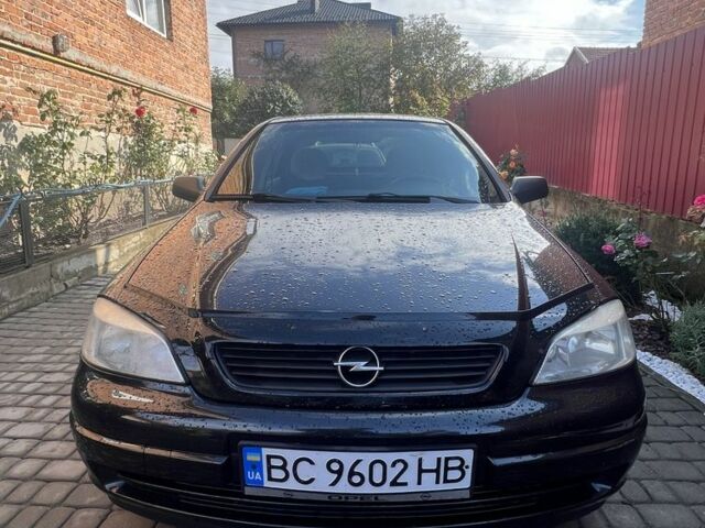 Черный Опель Астра, объемом двигателя 1.6 л и пробегом 151 тыс. км за 3700 $, фото 1 на Automoto.ua