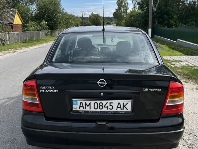 Черный Опель Астра, объемом двигателя 1.6 л и пробегом 280 тыс. км за 1906 $, фото 2 на Automoto.ua